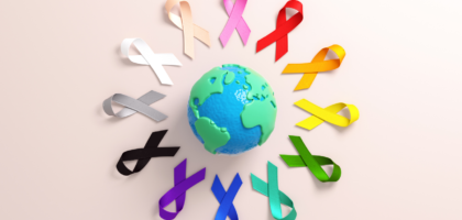 Cancer awareness ribbon symbol for World Cancer Day
