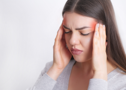 Woman suffering from migraine headache